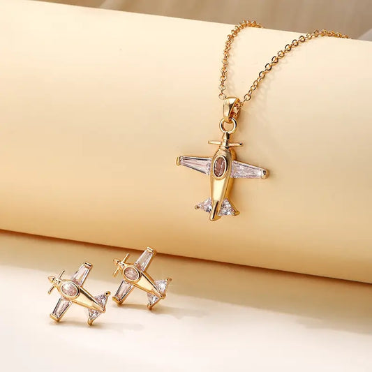 SkyGlow Airplane Jewelry Set – Earrings & Necklace